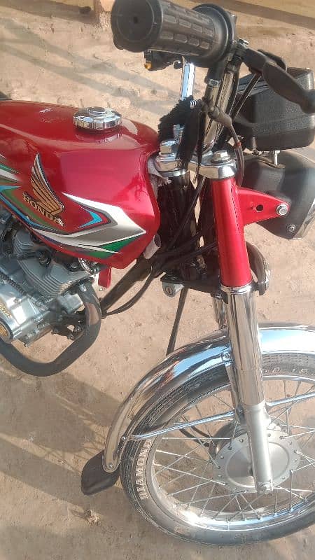 Honda 125 2023 model neet and clean condition Islamabad number 3 digit 6