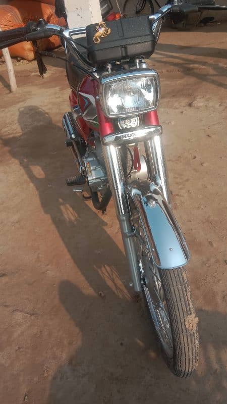 Honda 125 2023 model neet and clean condition Islamabad number 3 digit 7