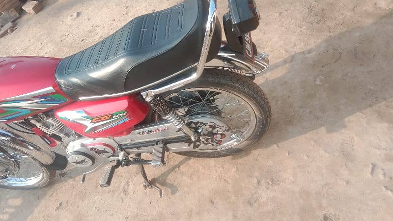 Honda 125 2023 model neet and clean condition Islamabad number 3 digit 11