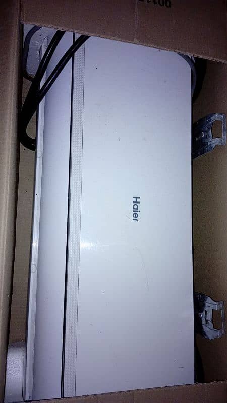 Haier dc inverter 1 ton in white color HSU-12HF (FLEXIS SERIES) 1