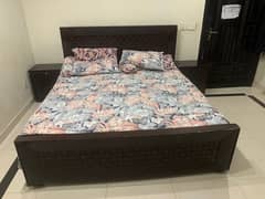 king size bed with 2 side table but without mattress