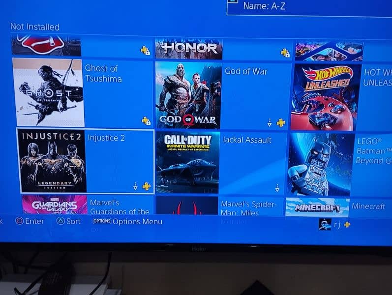 Sony PlayStation 4 Console with Games and Box 11