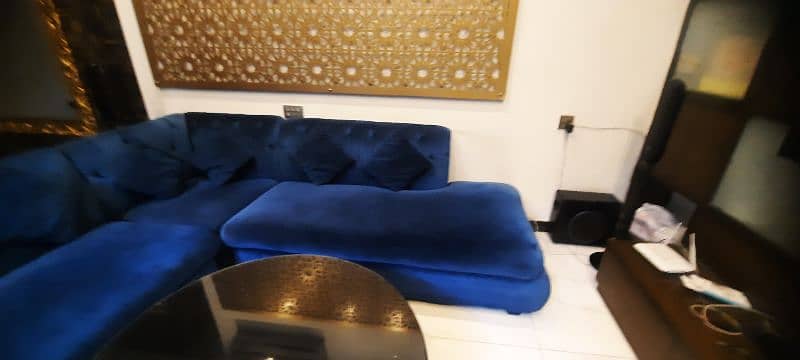 L shaped sofa + table 1