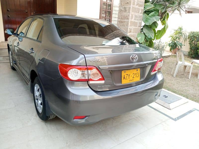 Toyota Corolla GLI 2013 Manual 100% Original Paint in DHA Karachi 8