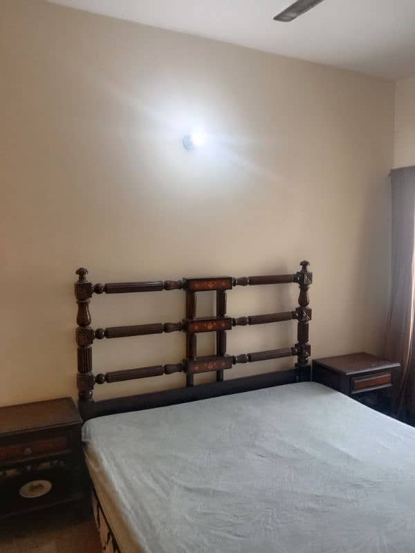 wooden king size bed with mattress in very good condition 0