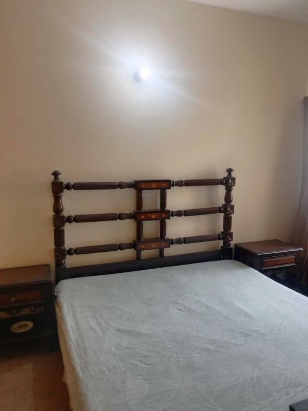 wooden king size bed with mattress in very good condition 1