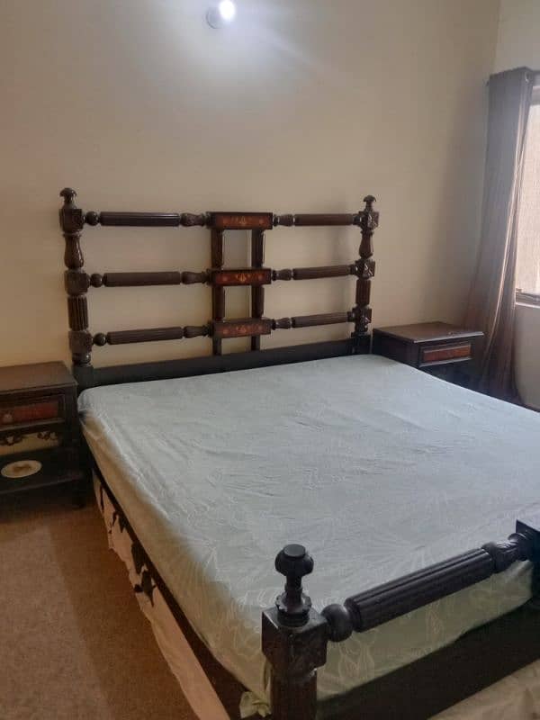 wooden king size bed with mattress in very good condition 3