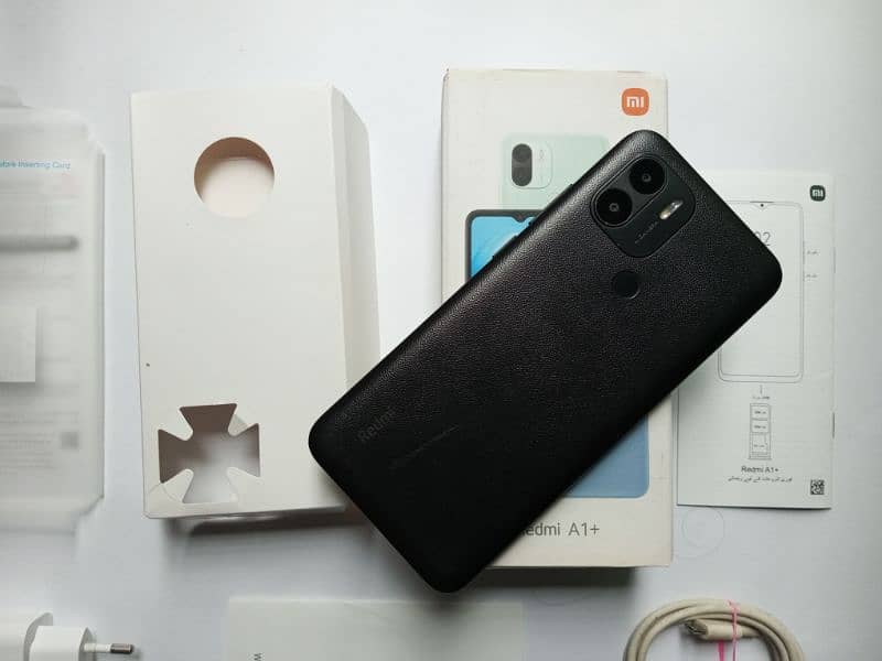 XIAOMI REDMI A1+ WITH BOX & CHARGER 6