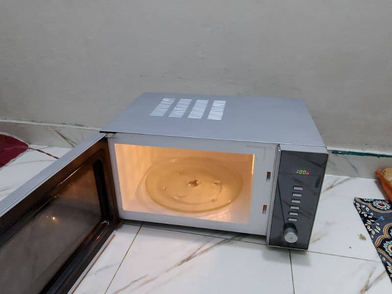 Dawlance microwave oven 2 in 1 grill cooking microwave oven 0