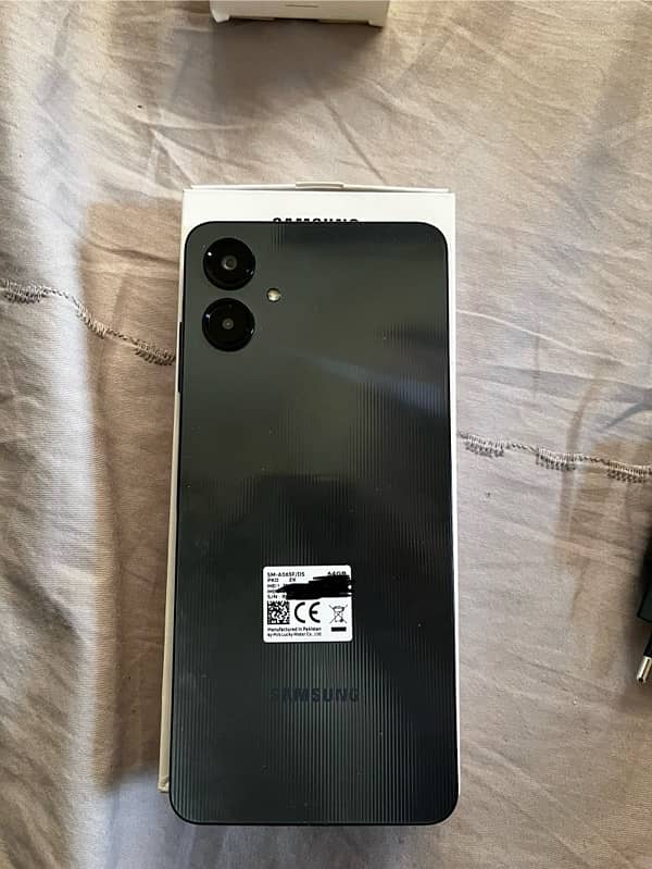 Samsung a06 , 4/64 , open box 0