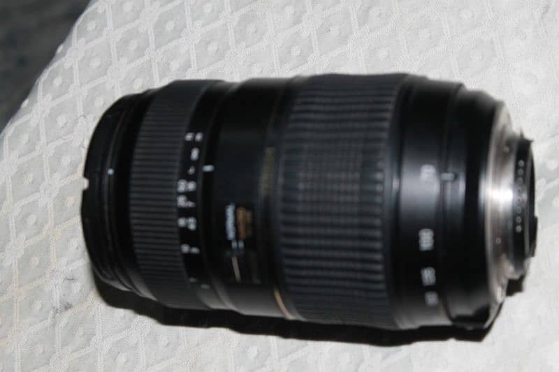 Nikon D5300 with original 18-55mm lense and Tamron 70-300lense 7