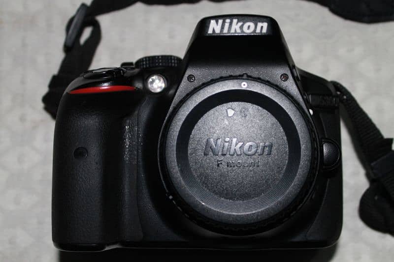 Nikon D5300 with original 18-55mm lense and Tamron 70-300lense 8