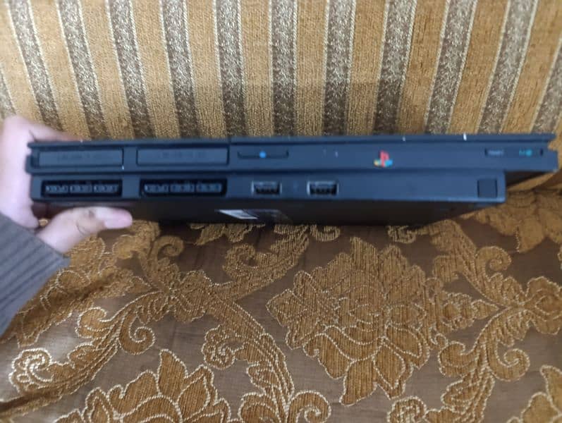 PS2 , 1 remote, 1 memory card, power cable, AV cable 13