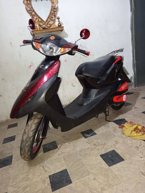 honda dio 100% ok red black 2