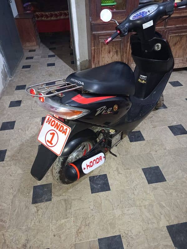 honda dio 100% ok red black 3