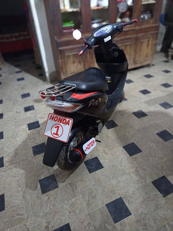 honda dio 100% ok red black 4