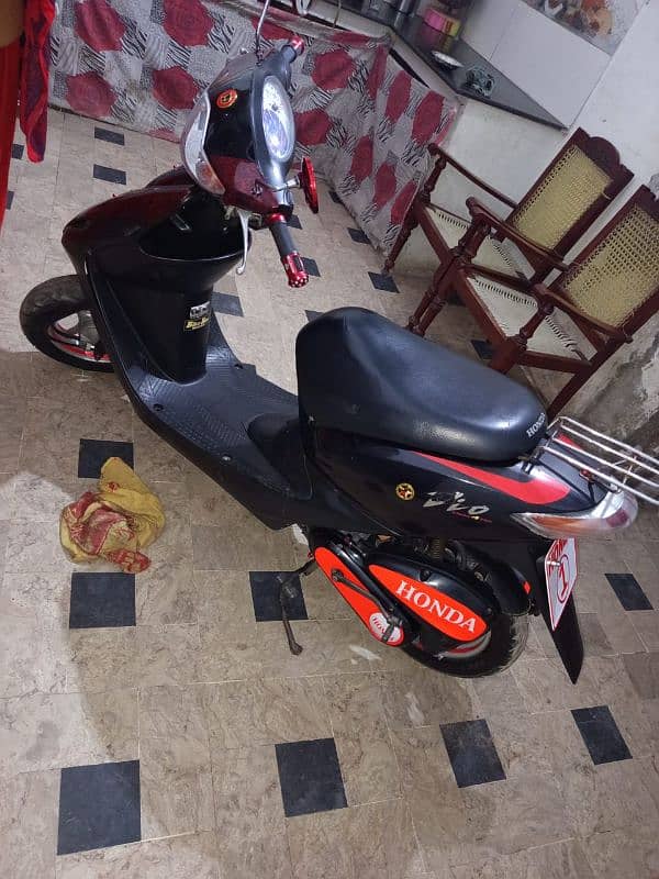 honda dio 100% ok red black 5