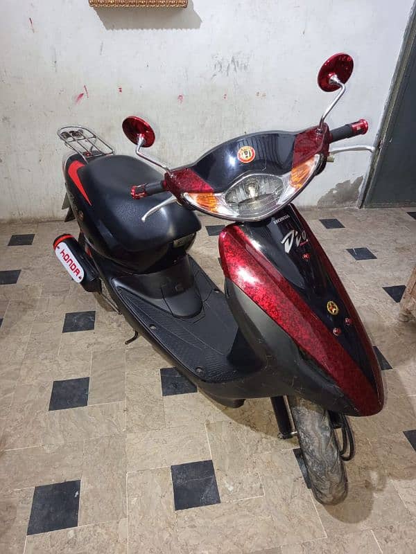 honda dio 100% ok red black 6