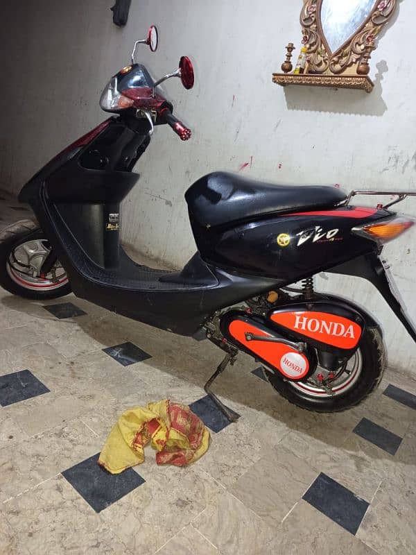 honda dio 100% ok red black 8