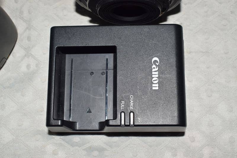 canon EOS1100d with 18 -55 lense 7