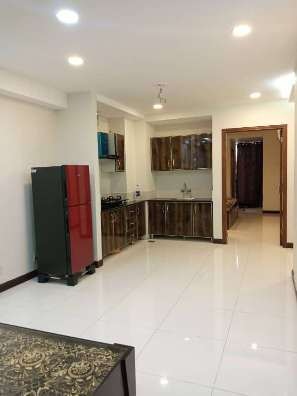 BRAND NEW LUXURY FURNISHED FAMILY FLAT AVAILABLE FOR RENT IN BAHRIA TOWN LAHORE 1