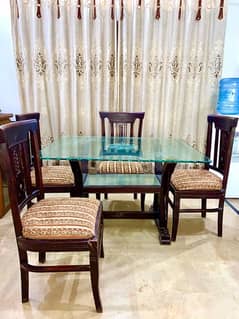 four seater wooden dining table