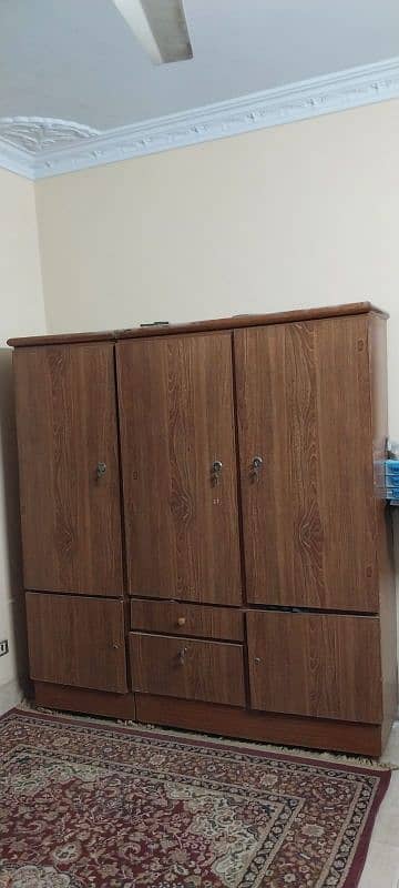 3-door wooden cupboard 1