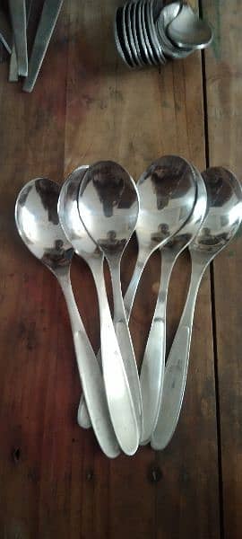 steel trays and tray spoons ( steel) , also four types of table spoons 11