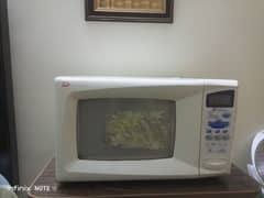 Microwave oven in use for sale Gulzar e quaid Rawalpindi