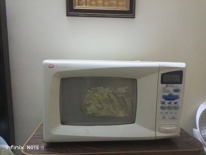 Microwave oven in use for sale Gulzar e quaid Rawalpindi 0