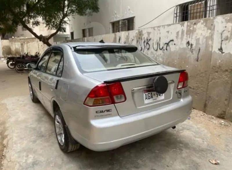 Honda Civic EXi 2004 prosmetic better then Corolla city liana 3