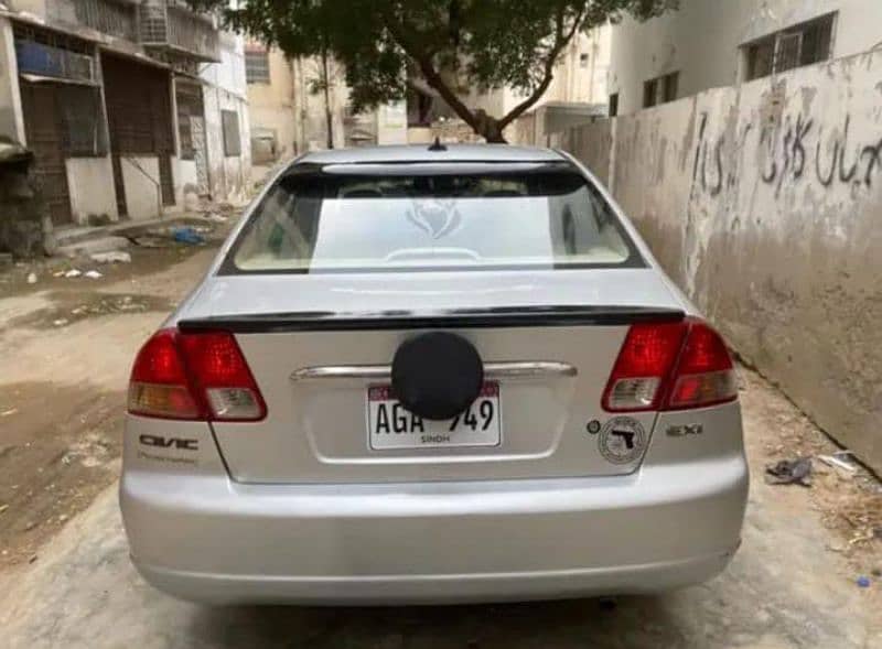 Honda Civic EXi 2004 prosmetic better then Corolla city liana 4