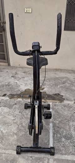 Gym cycle with resistance gear