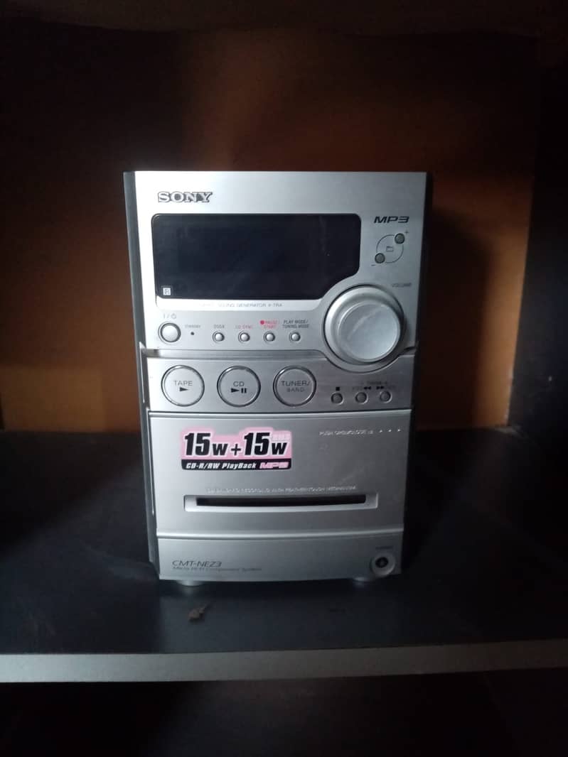 Samsung TV + Sony CD player along with TV trolley 10