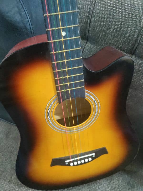 Acoustic guitar with bag and picks 8