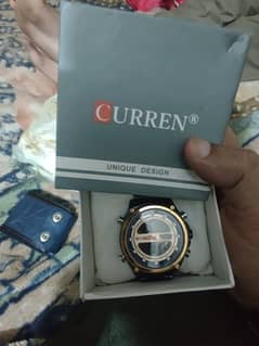 Curren watch day & date dual time