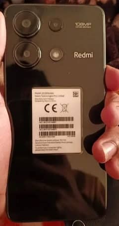 I am selling Redmi note 13 8 GB 256 GB mobile warranty ma ha