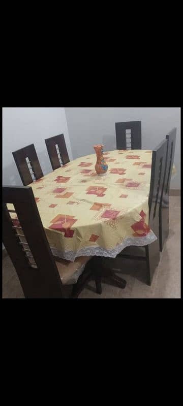 6 seaters wooden dining n chairs very good condition 0