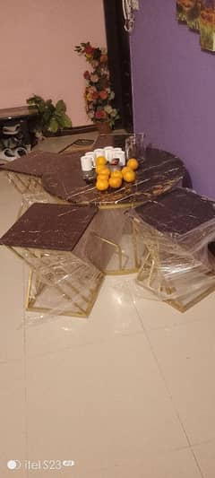 new style dining marble table with 4 stylish stools.