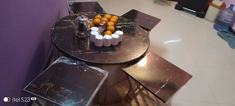 new style dining marble table with 4 stylish stools. 3