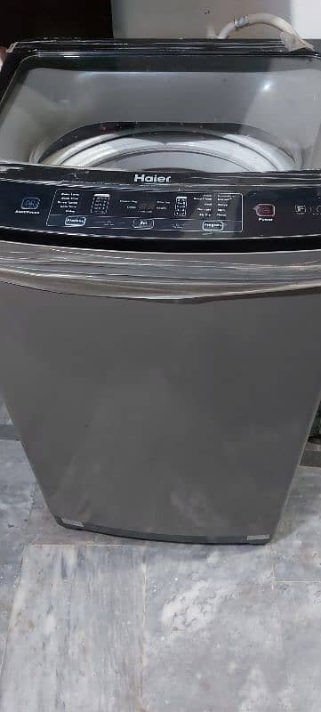 Haier fully automatic washing machine 9kg lush condition 4