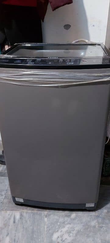 Haier fully automatic washing machine 9kg lush condition 6