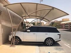 Tensile fabric Car parking shade for protection from heat