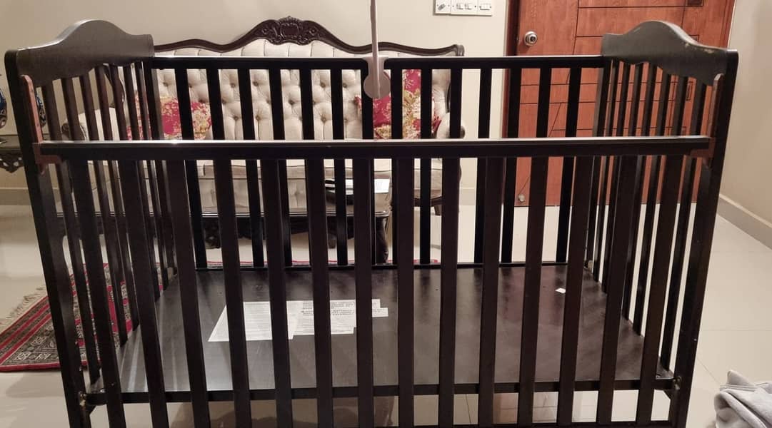 Baby cot in good condition 9