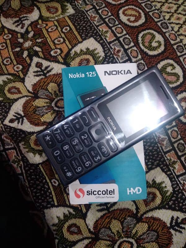 Nokia 125 4G  mobile just Box open Dual sim all ok 11