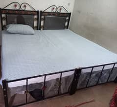 2 Iron Single Beds for Sale - Durable and Affordable.