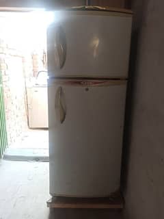 RS: 23000)medium size fridge for urgent sale