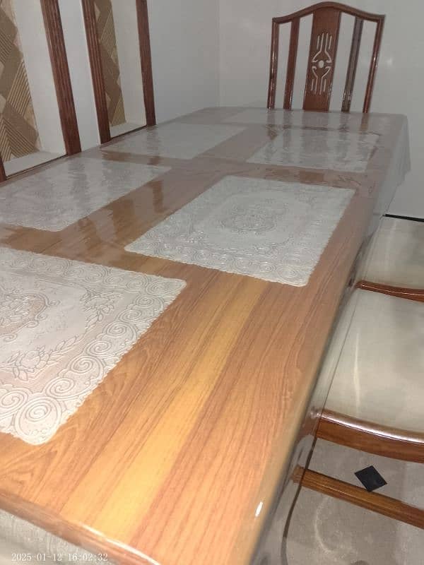 Dinning table and six chairs 4