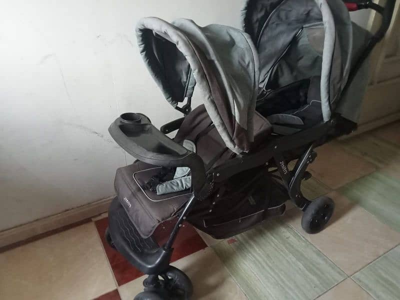 imported double baby pram . . 1