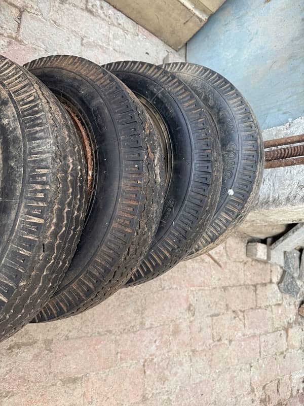 12 k tyres with rims ha brand new more info contact 0